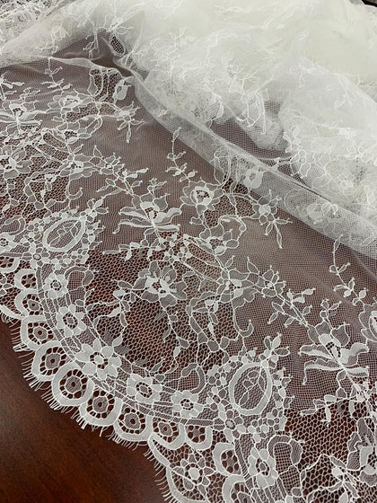 Moosa's Fabrics - Chantilly Lace - Vintage Perfection, with double sided  fringe - available in off white and black - #vintage #chantilly  #chantillylace #weddingdress #fabric #couture #eveningdress #bridal  #vintagestyle #bridalfashion #hautecouture